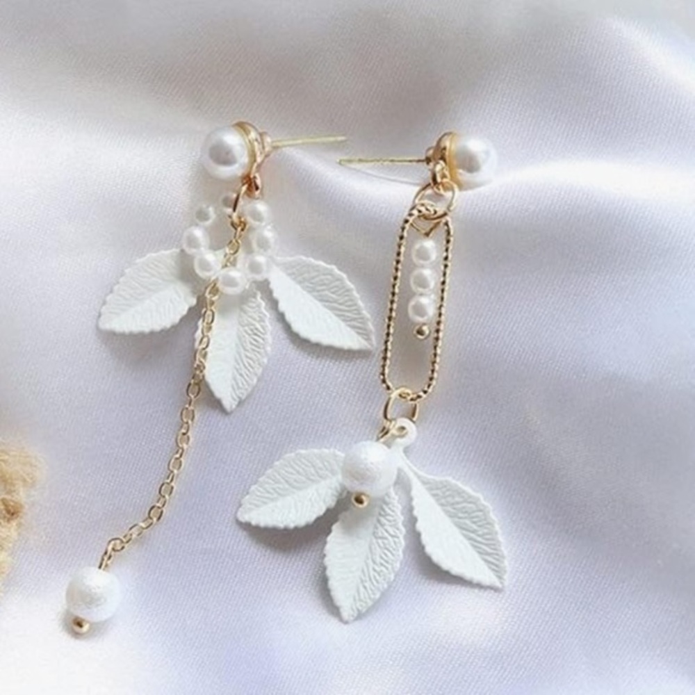 Asymmetrical whimsical boho dainty earrings white leaf gold accents shimmer